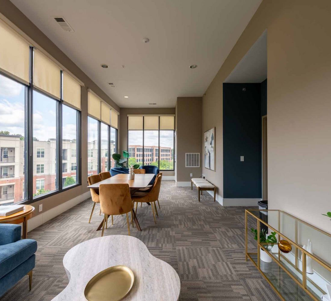 Apartments at Palladian Place with sky lounge, tables, chairs, and a view