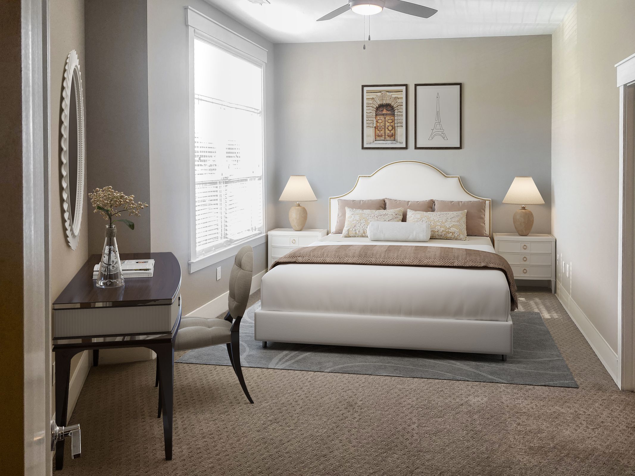 Apartments at Palladian Place in Durham, NC apartment interior bedroom with large bed, a desk, carpet, and lots of natural light