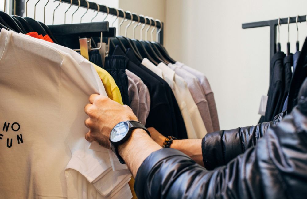 Apartments at Palladian Place in Durham, NC near The Streets at Southpoint mall with people shopping near Macy's