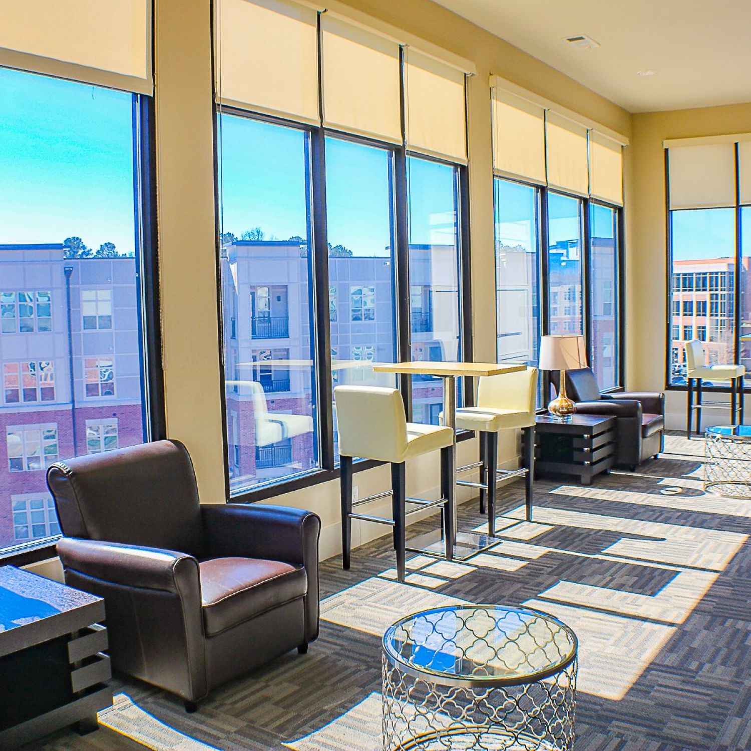 Apartments at Palladian Place with sky lounge, tables, chairs, and a view