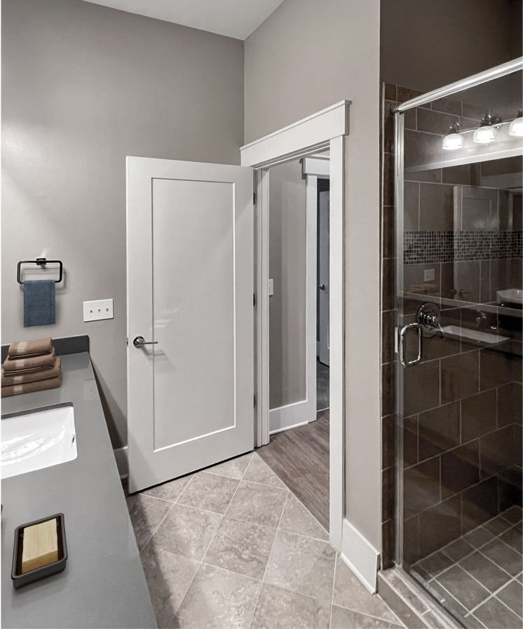 Apartments at Palladian Place in Durham, NC apartment interior bathroom ceramic tile and glass shower enclosure