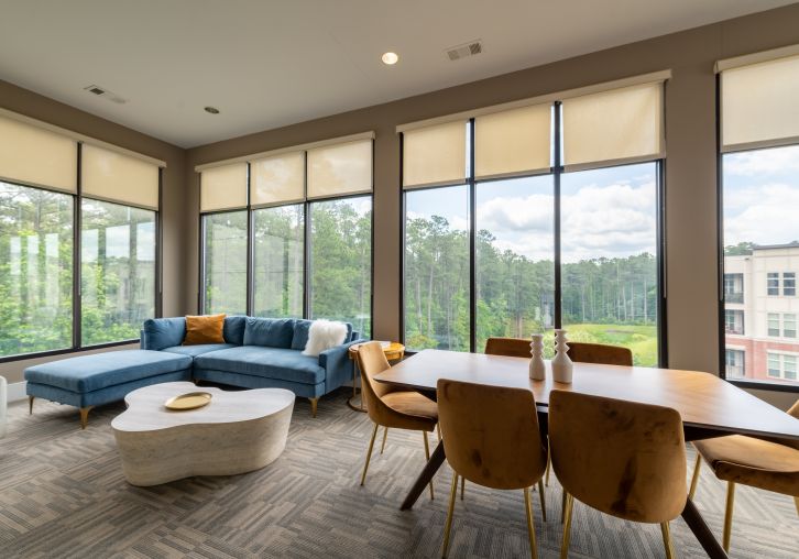 Apartments at Palladian Place with sky lounge, tables, chairs, and a view