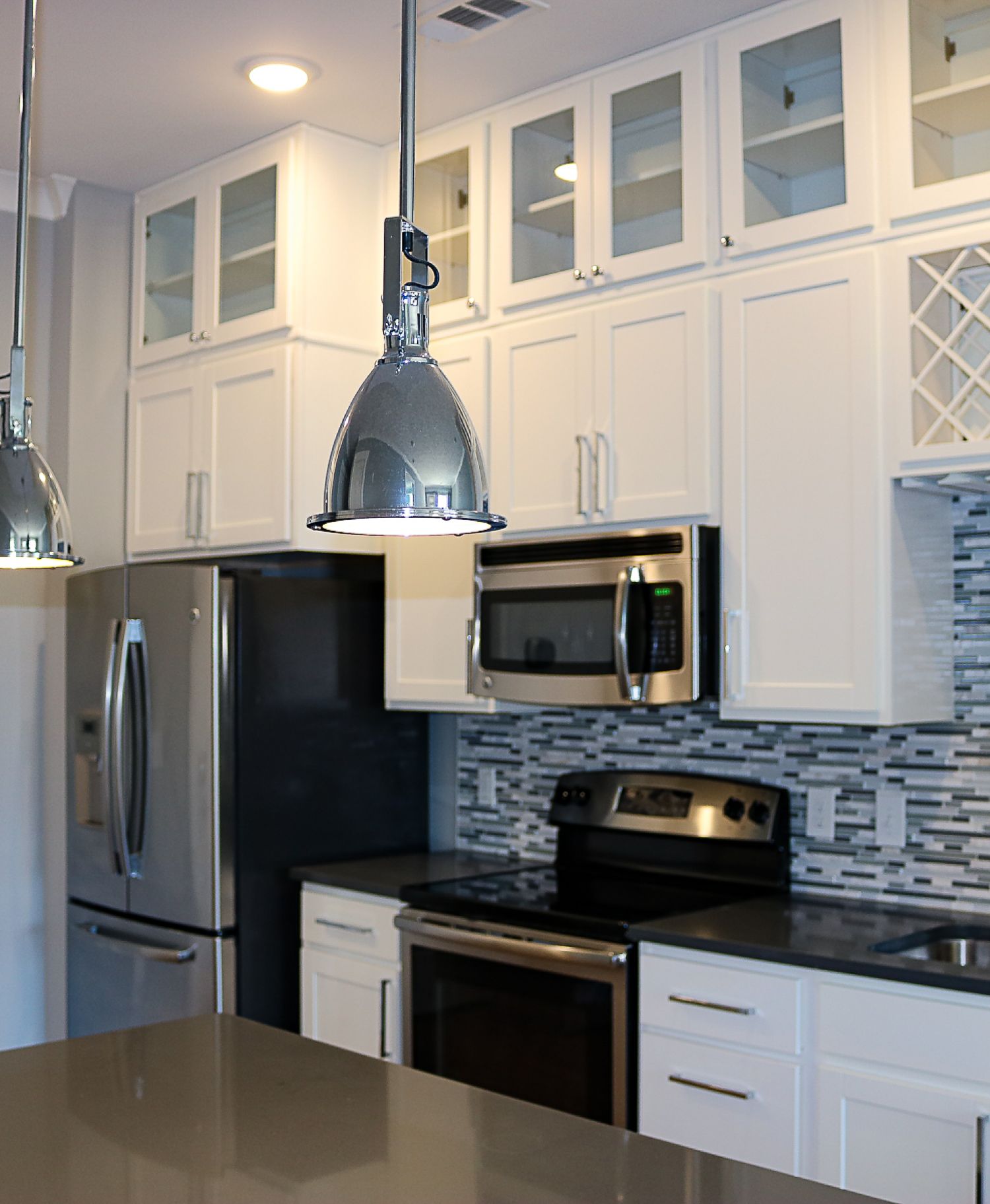 Apartments at Palladian Place in Durham, NC apartment interior bathroom with ceramic tile and glass enclosed shower