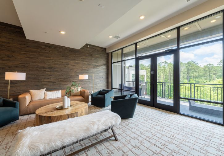 Apartments at Palladian Place with sky lounge, tables, chairs, and a view