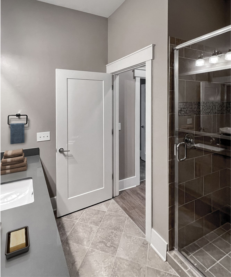 Apartments at Palladian Place in Durham, NC apartment interior bathroom ceramic tile and glass shower enclosure