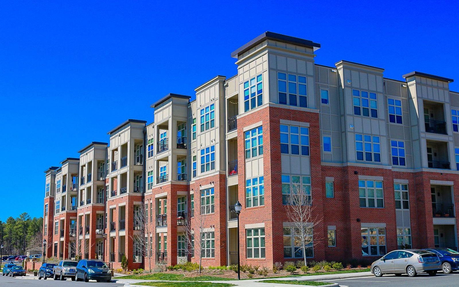 Apartments at Palladian Place building exterior with blue sky
