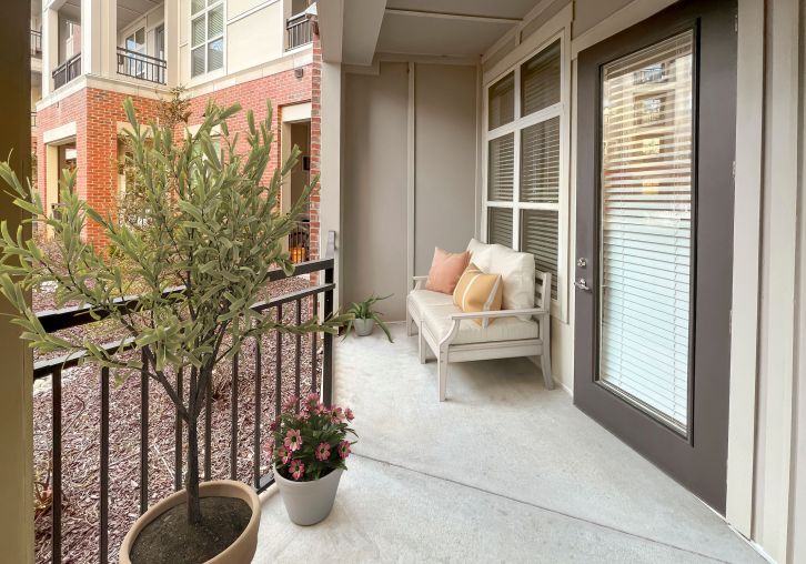 Apartments at Palladian Place building exterior and sparkling pool