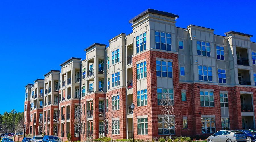 Apartments at Palladian Place building exterior with blue sky
