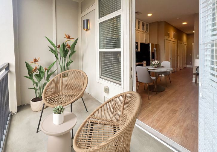 Apartments at Palladian Place building exterior and sparkling pool