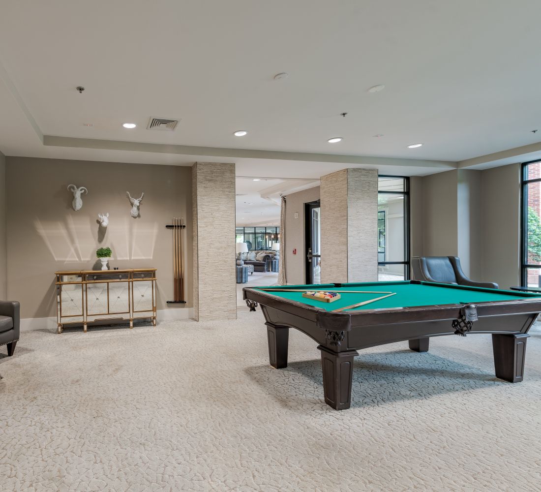 Apartments at Palladian Place with game room and billiards table and TV