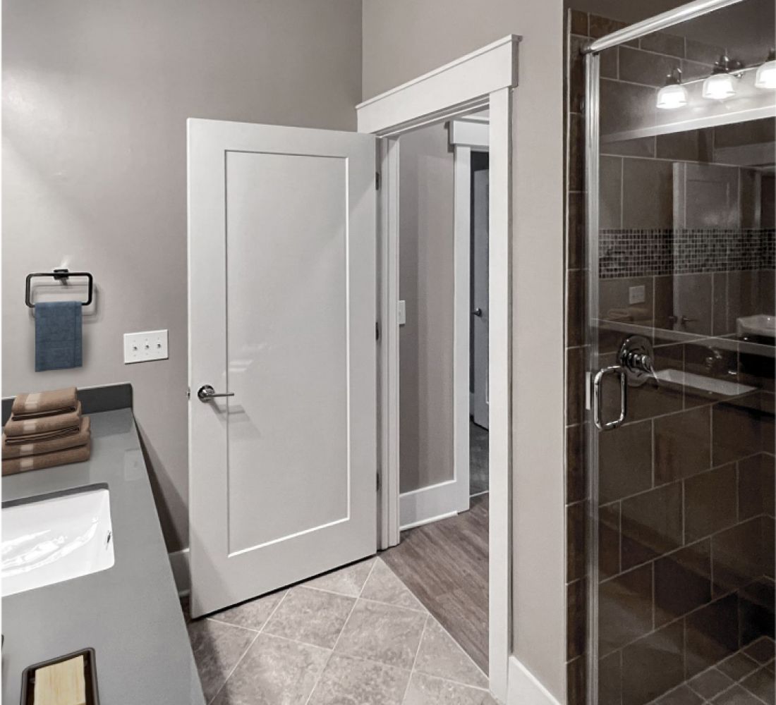 Apartments at Palladian Place in Durham, NC apartment interior bathroom ceramic tile and glass shower enclosure
